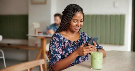 Poster - Happy woman, typing and social media with phone at cafe for remote work, email or chatting app. Female person, customer or freelancer with smile on mobile smartphone for communication at coffee shop