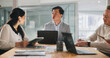 © peopleimages.com - Collaboration, management and meeting with business people in office for development or discussion. Laptop, planning and tablet with corporate team in workplace for conversation, strategy or update