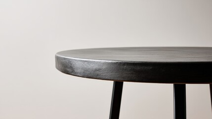 Wall Mural - Elegant Round Black Table Design with Minimalist Aesthetic