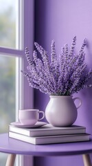 Fototapete - A serene indoor setup features a lavender arrangement in a pitcher beside a cup on a plate, placed atop a stack of books against a purple backdrop. The atmosphere exudes calmness