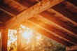 © AlparadiseDesign - Warm wooden roof beams catching golden sunlight.