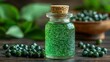 © MABRUR - Green extract in a small glass bottle with cork