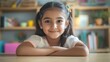 © Johannes - Happy cute smart hispanic indian preteen kid girl student, latin child primary school pupil studying at table at home, learning sitting at classroom desk looking at camera, schoolgirl portrait. illus