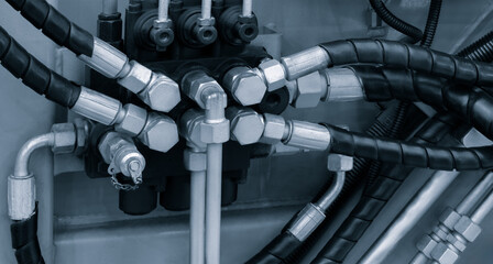 Aufkleber - Bundle of pipes connected to industrial hydraulic pneumatic machine, industrial concept background.