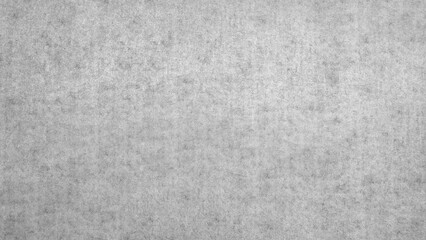 Poster - A grey background with a few black dots scattered around. dots are placed in various sizes and positions, creating a sense of depth and texture. overall effect is a somewhat chaotic.