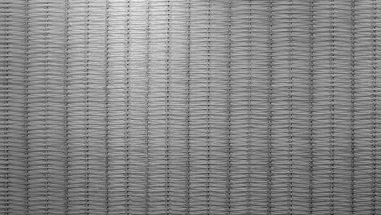 Poster - A grey and white woven fabric with a striped pattern. stripes are of varying sizes and arranged in such a way as to create a sense of depth and texture. background is lit from above
