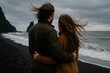 © Alice - Couple Embracing on Windy Black Sand Beach