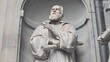 © Michael - Florence, Italy - 3 January 2025. Marble statue of Galileo Galilei by Aristodemo Costoli, showing his contemplative gaze and hands holding a telescope, part of the Uffizi’s exterior sculpture series.