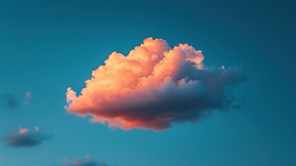 Wall Mural - Cloud at dusk. Pink, orange glow against the teal blue sky