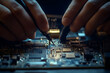 © bulan - Close Up Of Hands Repairing Circuit Board With Tweezers