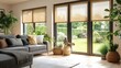 © dewi - Modern living room with large windows and garden view, featuring neutral color scheme and natural light