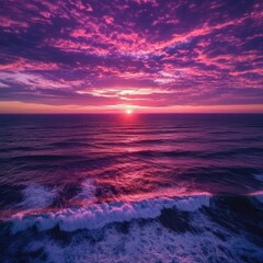 Wall Mural - Majestic Ocean Sunset with Vibrant Pink and Purple Hues Reflecting on the Water Surface