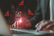 © BritCats Studio - Close up shot of people point to access to personal data and document with warning sign as concept of data breach or attack from hacker or spyware. Data security concept.