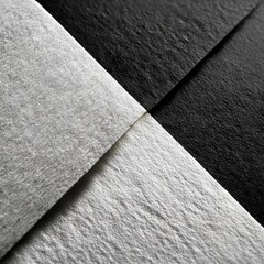 Poster - Artistic Monochrome: An Abstract Close-Up of Intersecting White and Black Textured Surfaces for Visual Contrast