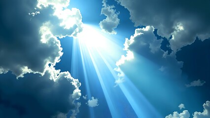 Wall Mural - Sunlight streams through dramatic clouds, creating radiant beams against a bright blue sky.