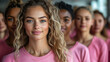 © ezen - A diverse group of women in pink shirts, one woman prominently in the foreground, conveying unity and empowerment