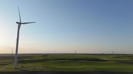 Aufkleber - Wind turbine on an agricultural filed at sunset	