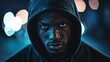 © Lumi_Studio - Young black man in hoodie, urban background, moody lighting, shallow depth of field, cinematic tone