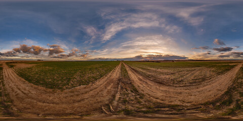 Wall Mural - hdri 360 panorama on gravel road among farming fields with tire tracks in equirectangular full seaml