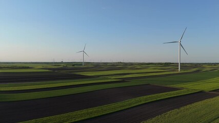 Aufkleber - Aerial view of wind turbines on an agricultural field. Sustainable energy	