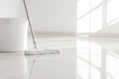 © A2Z AI  - Mop and bucket on a freshly cleaned tiled floor in a bright, naturally lit, white room. Sunlight streams through the window. Cleanliness and hygiene.
