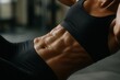 © Boke - Athletic woman showing sculpted abs while exercising in gym
