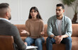 © Prostock-studio - Portrait of serious young lady talking to psychologist counselor complaining on bad relationship with husband, family couple counseling having conversation about problem at therapy session