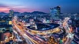 The modern architecture of Dongdaemun Design Plaza illuminated at night