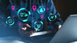 © ImageFlow - Digital logistics icons over world map with person using smartphone and laptop in dark setting.