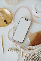 Wall Mural - Modern Smartphone and Notebook Arranged with Cotton Bag in Soft Natural Style
