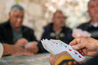 © Sondem - The village elders are playing cards in the coffeehouse.