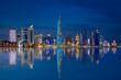 © hasan - The Panoramic skyline of Doha, Qatar during sunrise