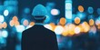 © Panithi - Professional Man in Suit with Hard Hat Looking at City Lights Night