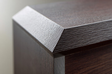Aufkleber - Geometric luxury wood design with plain color, close up of modern furniture corner, textured dark brown surface, minimalistic style, elegant and sophisticated appearance