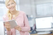 © peopleimages.com - Thinking, woman and online with tablet in office for communication, post and content creation for agency. Girl, creative manager and internet for business social media, account and trend influencer.