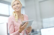 © peopleimages.com - Office, business woman and thinking with tablet for project research, online website and working. Female receptionist, reading and planning for report, administration and tasks with technology