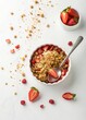 © Aleksandr - Minimalist cereal and strawberry bowl for healthy eating presentation