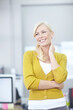 © peopleimages.com - Woman, thinking and smile in creative agency for start up, company and project management for career. Confidence, ambition and female designer in workplace with entrepreneurship and happy for ideas