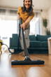© milanmarkovic78 - Woman Vacuuming Floor