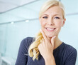 © peopleimages.com - Portrait, smile and solution with business woman in office hallway for career. Company, employee and idea with happy designer in creative workplace for professional thinking and problem solving
