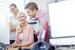 © peopleimages.com - Business people, computer and conversation in office with help for teamwork, problem solving and online solution. Happy, manager man and women with pc for internship training, new job and support