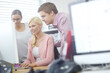 © peopleimages.com - Business people, teamwork and intern in office, computer and assistance with website. Internship, project managers and female trainee for human resources, tasks and administration on monitor