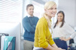 © peopleimages.com - Woman, smiling and portrait for business in office, confident and company pride with secretary or administrator. People, happy and coworking workplace, professional and creative startup or employee