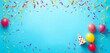 © Chavanlak - Overhead blue birthday banner with corner border, confetti, balloons, party hats, streamers, copy space, birthday,  celebration background