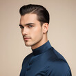 © Steven - Portrait of a handsome young man sporting a fashionable slicked-back undercut haircut against a neutral background