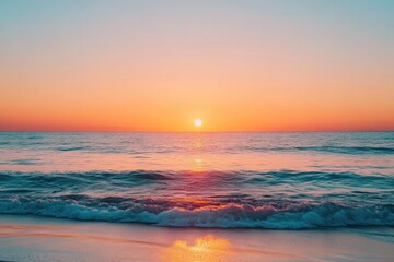 ocean waves crashing on sandy shore at warm sunrise with light reflection, water