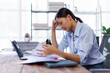 © David - Stress, anxiety or headache of business asian woman working on laptop online report, proposal or copywriting at workplace office desk Burnout, frustrated corporate worker with problem, fail or error.