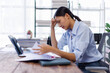 © David - Stress, anxiety or headache of business asian woman working on laptop online report, proposal or copywriting at workplace office desk Burnout, frustrated corporate worker with problem, fail or error.