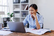 © David - Stress, anxiety or headache of business asian woman working on laptop online report, proposal or copywriting at workplace office desk Burnout, frustrated corporate worker with problem, fail or error.