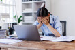 © David - Stress, anxiety or headache of business asian woman working on laptop online report, proposal or copywriting at workplace office desk Burnout, frustrated corporate worker with problem, fail or error.